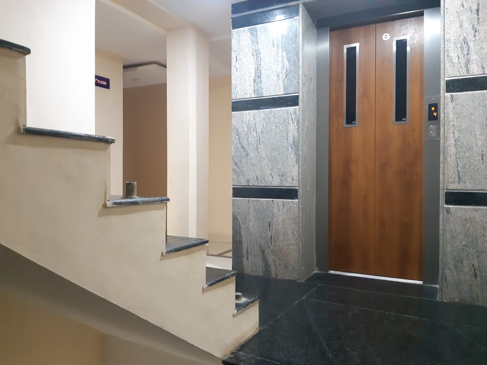 Lift and staircase at CNR Residency